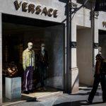 Prada Group says it has purchased fashion rival Versace in a deal worth nearly $1.4 billion